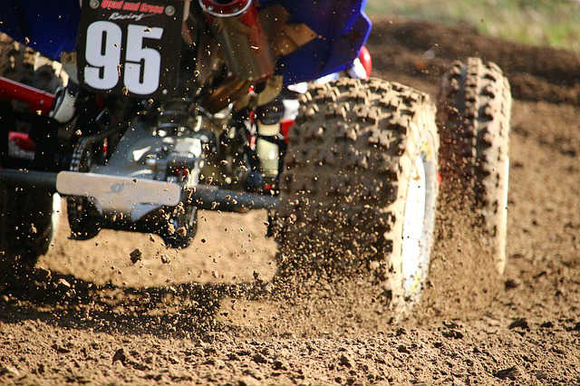 ATV Quad On Dirt Track Mud Tires